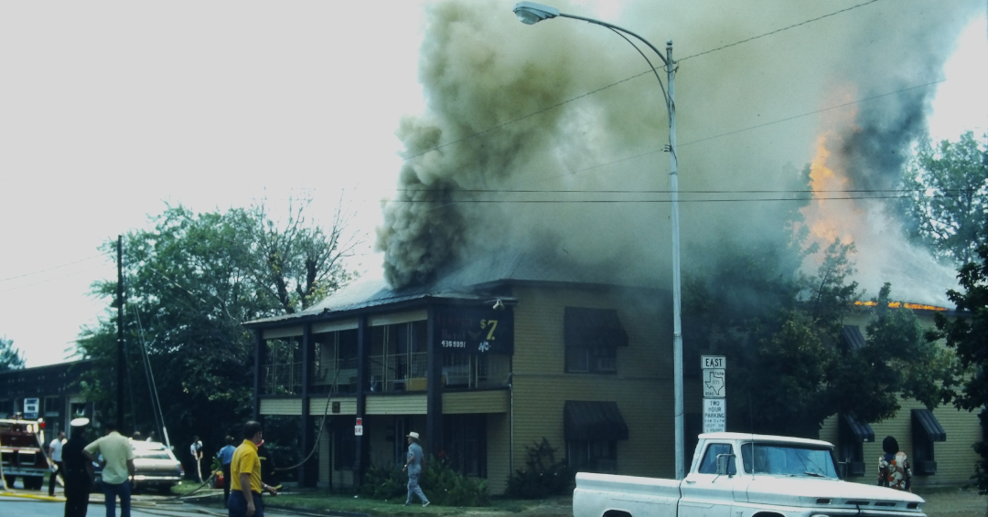 1976 Lewisville Hotel with flames